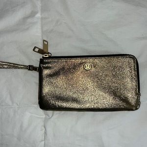 used lulu gold double pouch